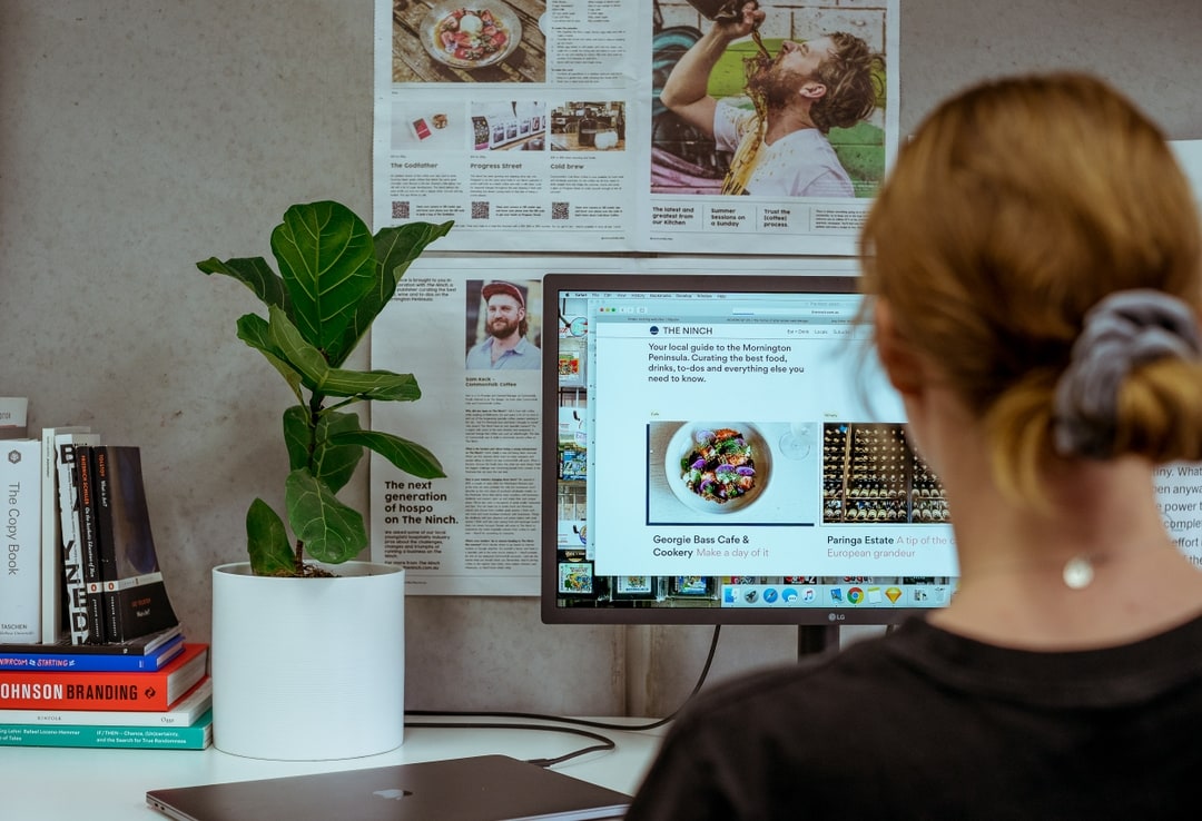 Designer in the ONETOO studio working on The Ninch website