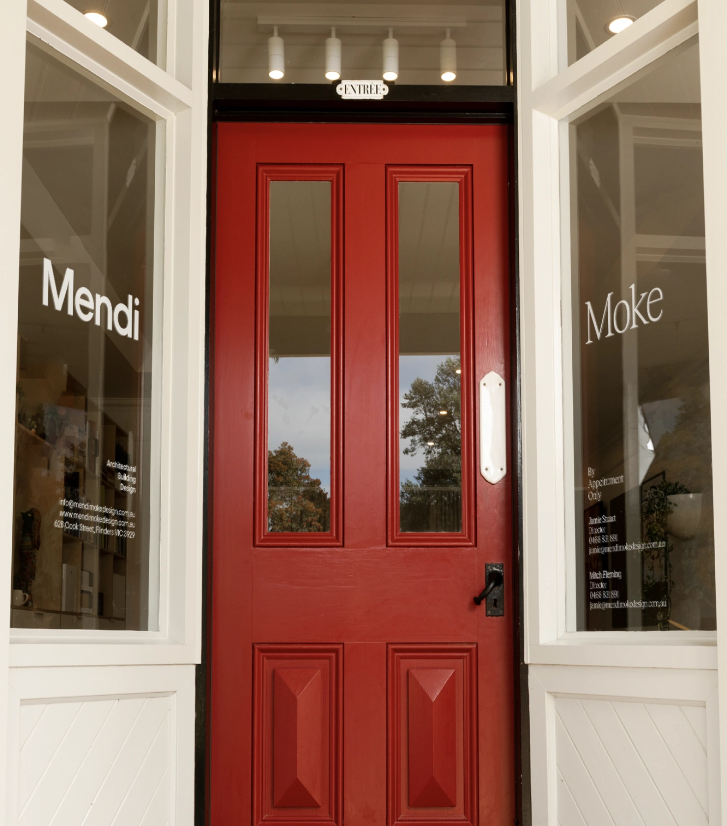 Branding Design for Mendi Moke, the red studio door with Mendi Moke window decals