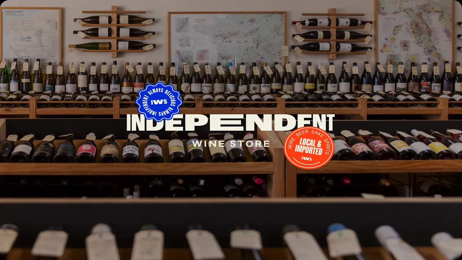 Independent Wine Store logo and badges over shelves of wine bottles