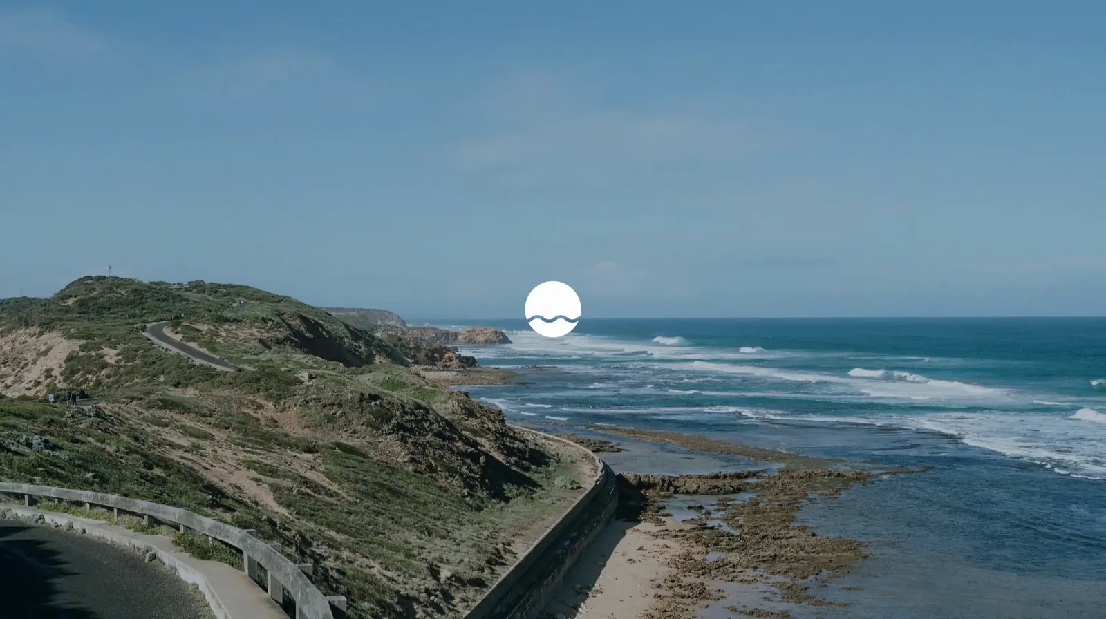 The Ninch wave logo over coastline footage, then The Ninch wordmark on navy