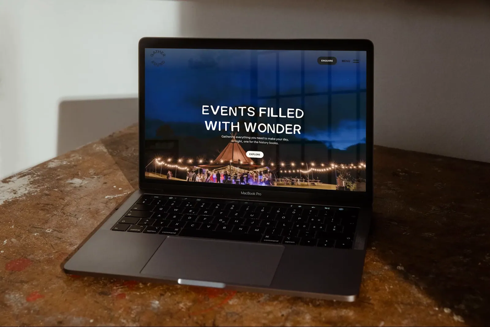 Branding Design for Gather Round Website on a laptop